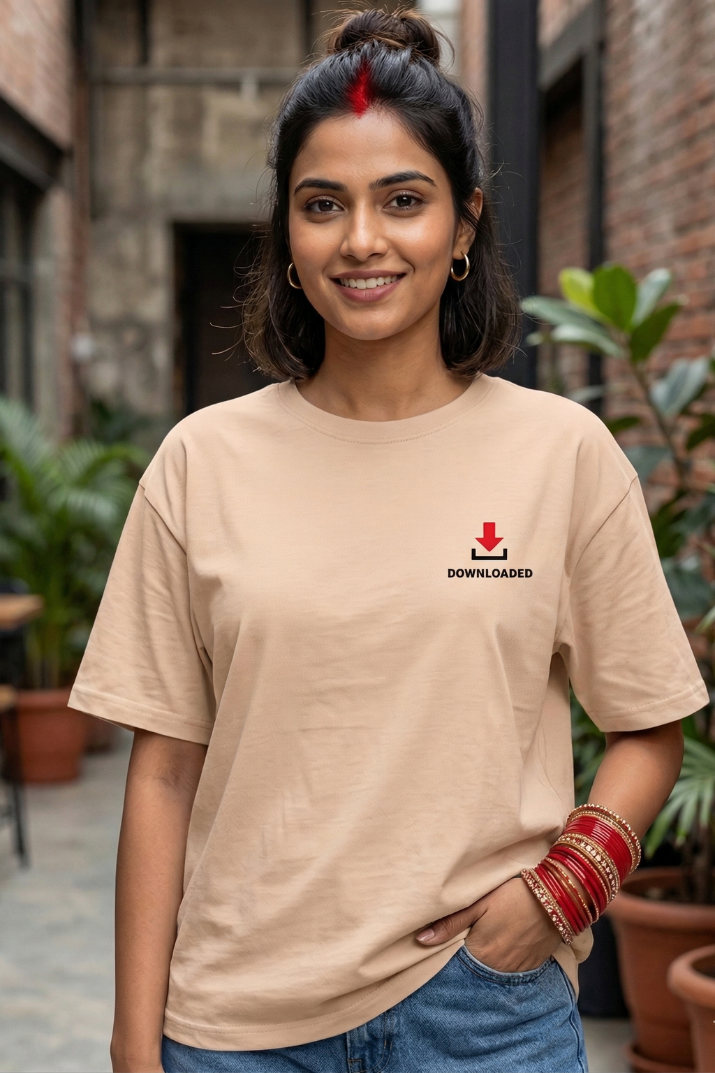 Woman wearing a beige t-shirt with a family matching tshirt in an outdoor setting
