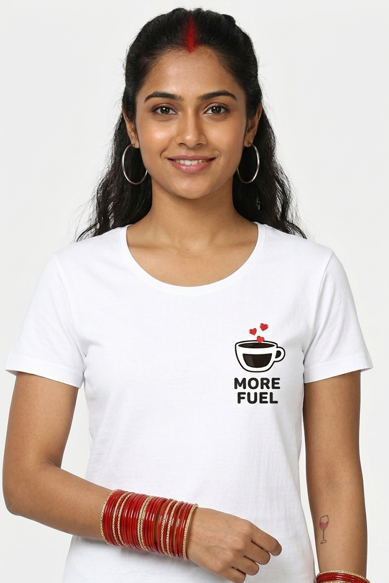 Woman wearing a white t-shirt with a coffee-themed graphic and text.